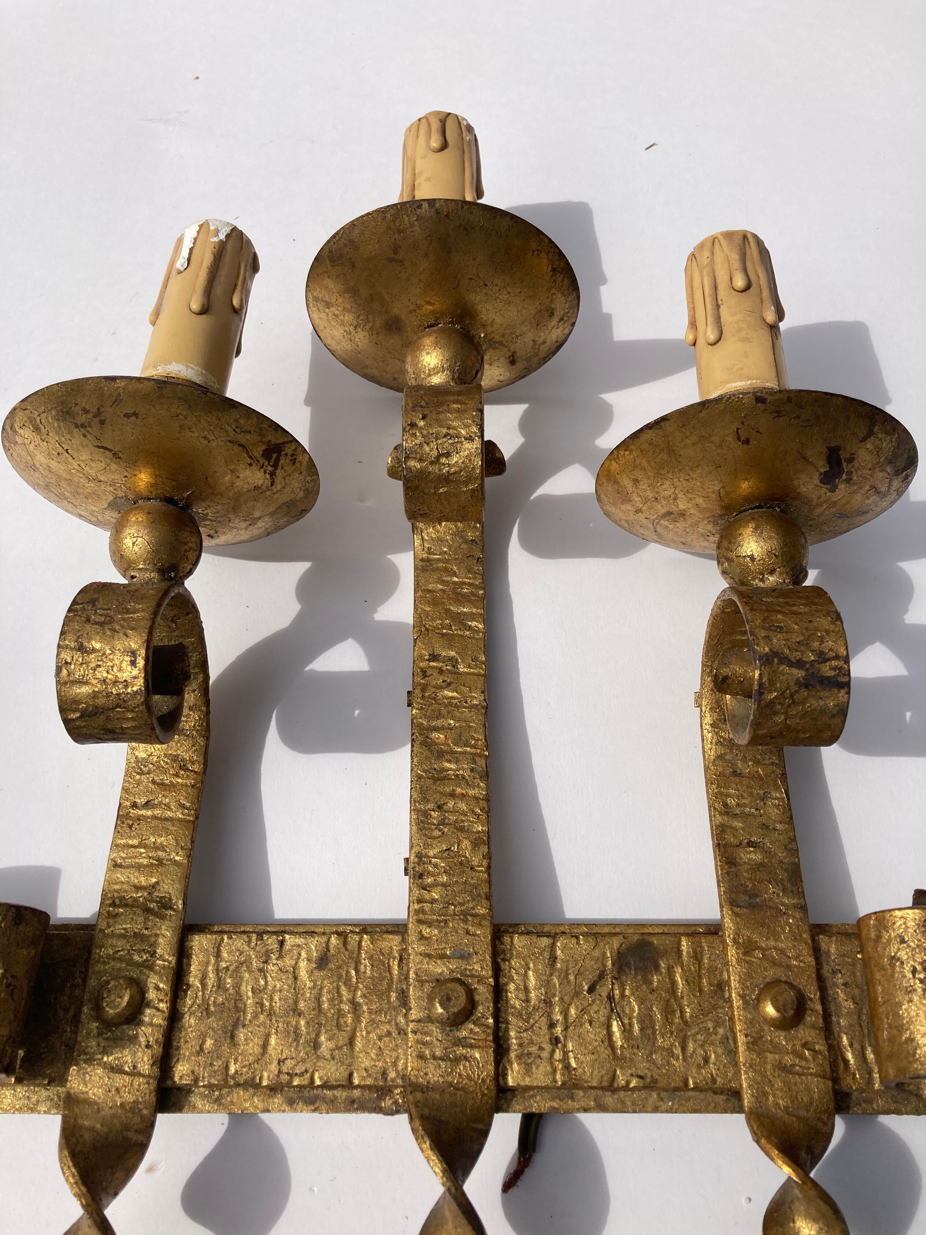 Wrought iron wall sconce brutalist