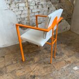 Pair of postmodern orange armchairs and bouclé wool fabric