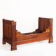 Bed made of solid walnut with marquetry details. France, 1930s.