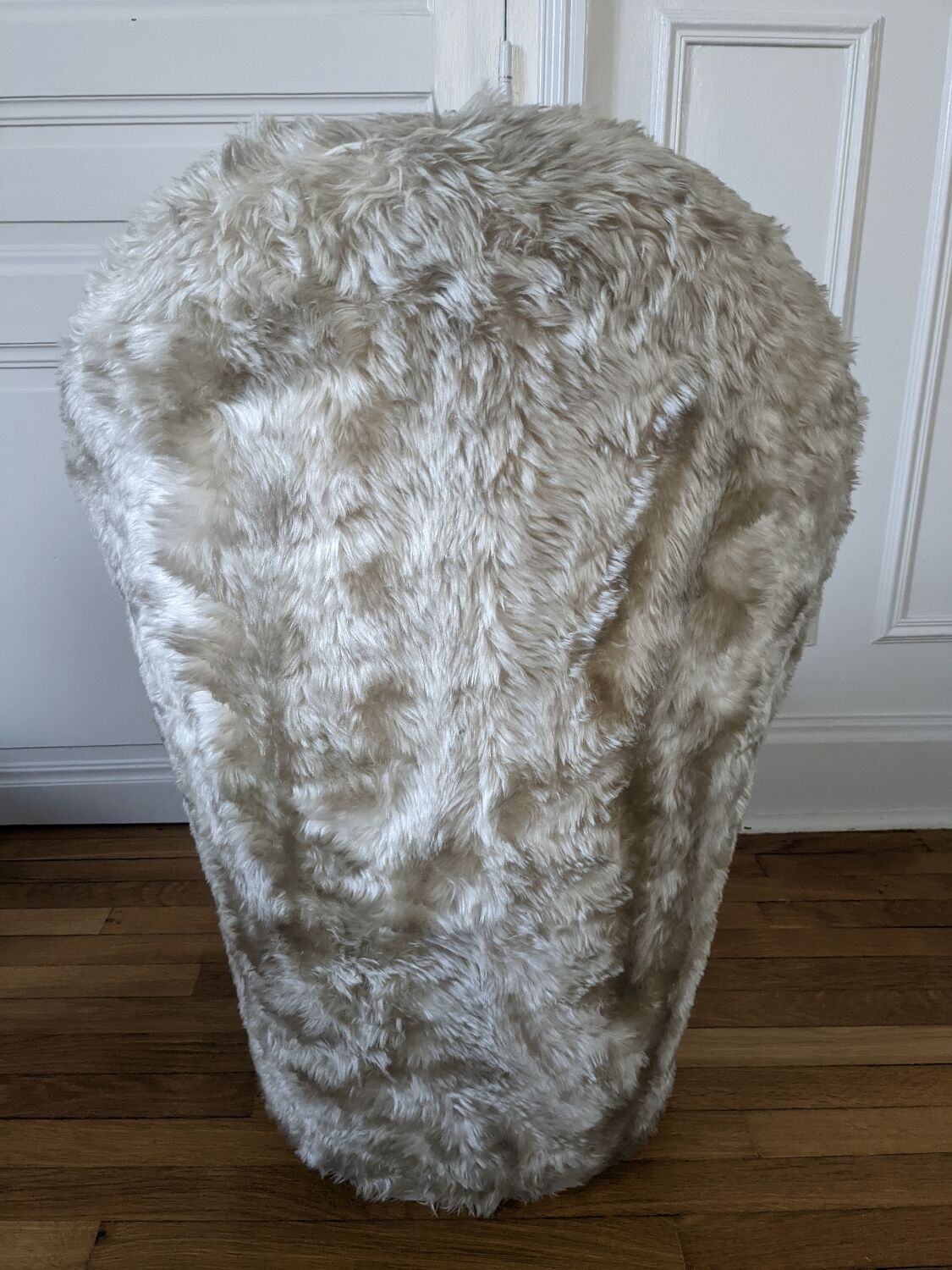 Beige moumoute armchair