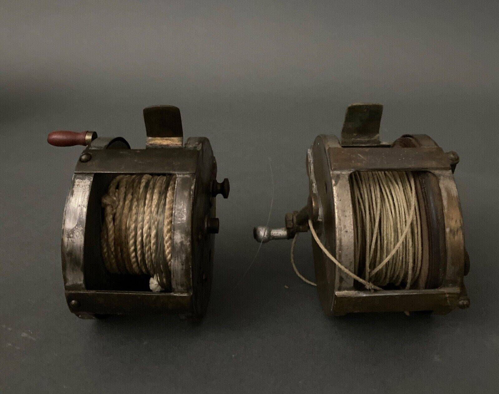 Two reel spools in their original 1900 box