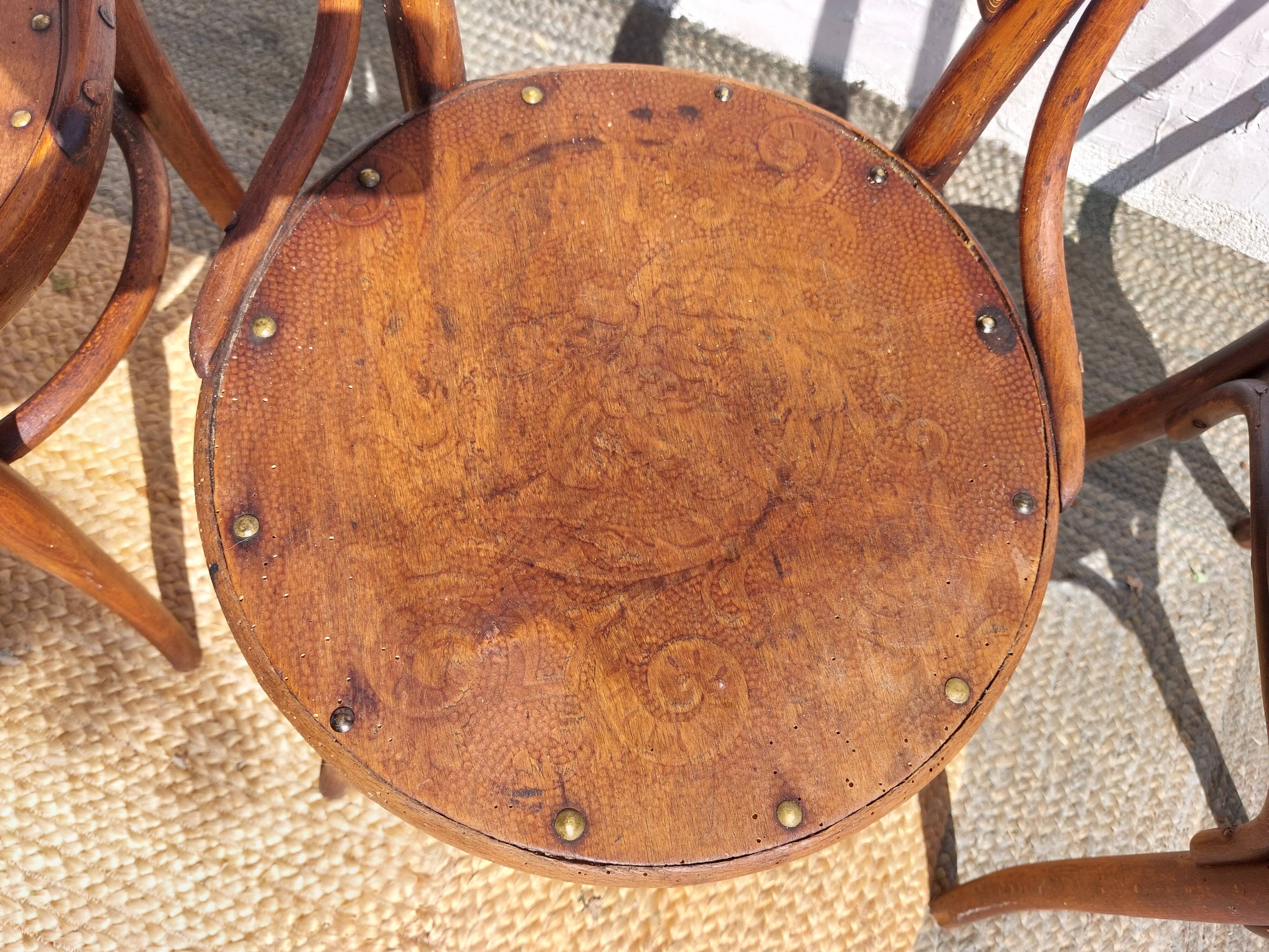 4 curved wooden bistro chairs