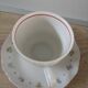 Lot of 5 coffee cups and porcelain saucers