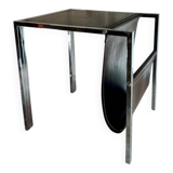 Vintage design magazine rack in chrome metal