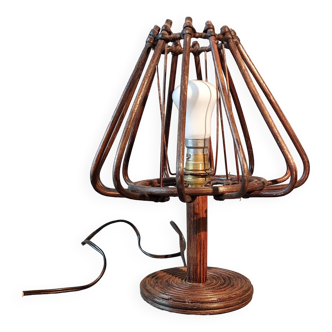 Vintage rattan bedside lamp.