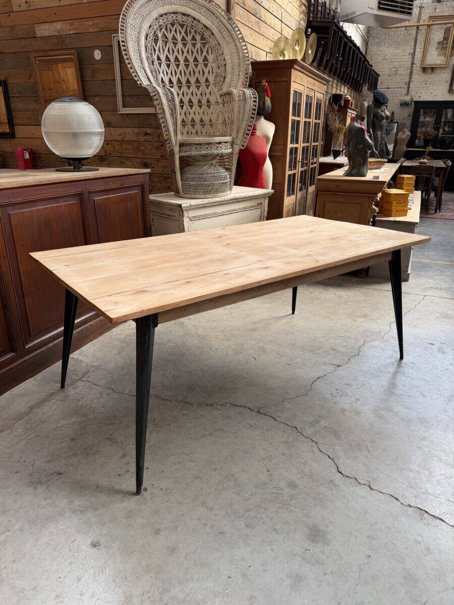 Old fir table with Tolix legs.