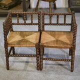 Pair of turned wooden corner chairs from the 1950s.