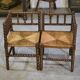 Pair of turned wooden corner chairs from the 1950s.