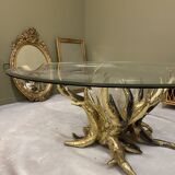 Round glass and brass table by designers Richard and Isabelle Faure