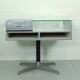 Counter with glass display from mid century barbershop interior
