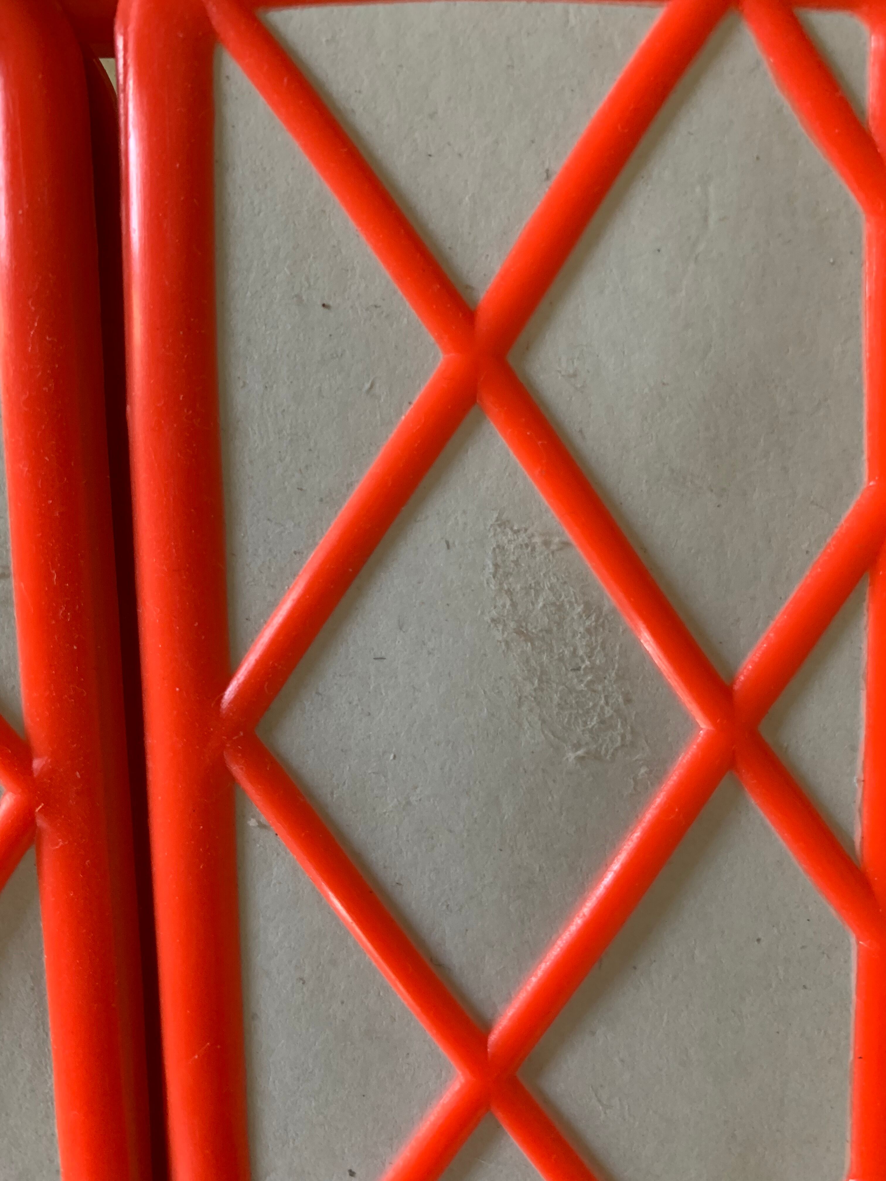 Orange plastic triptych mirror