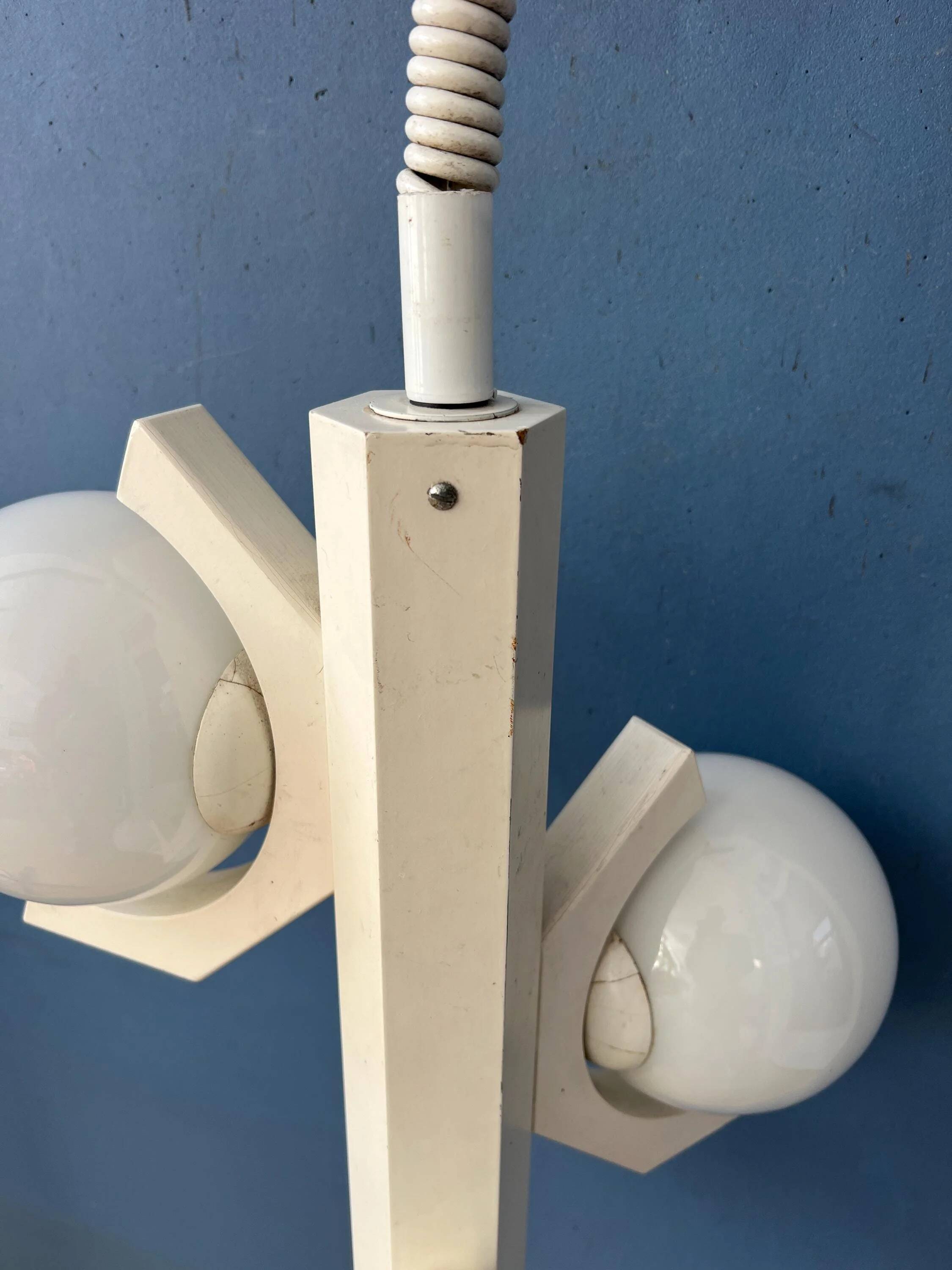 Mid-century white suspension with a bony design and opaline glass shade.
