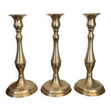 Set of three vintage brass candlesticks