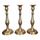 Set of three vintage brass candlesticks