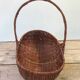 Former collection in braided wicker rattan with cove decoration vintage basket