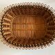 19th-century wicker basket embroidered by folk artisans.