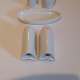 Set salt shaker, pepper tree and covered ceramic pot on small tray