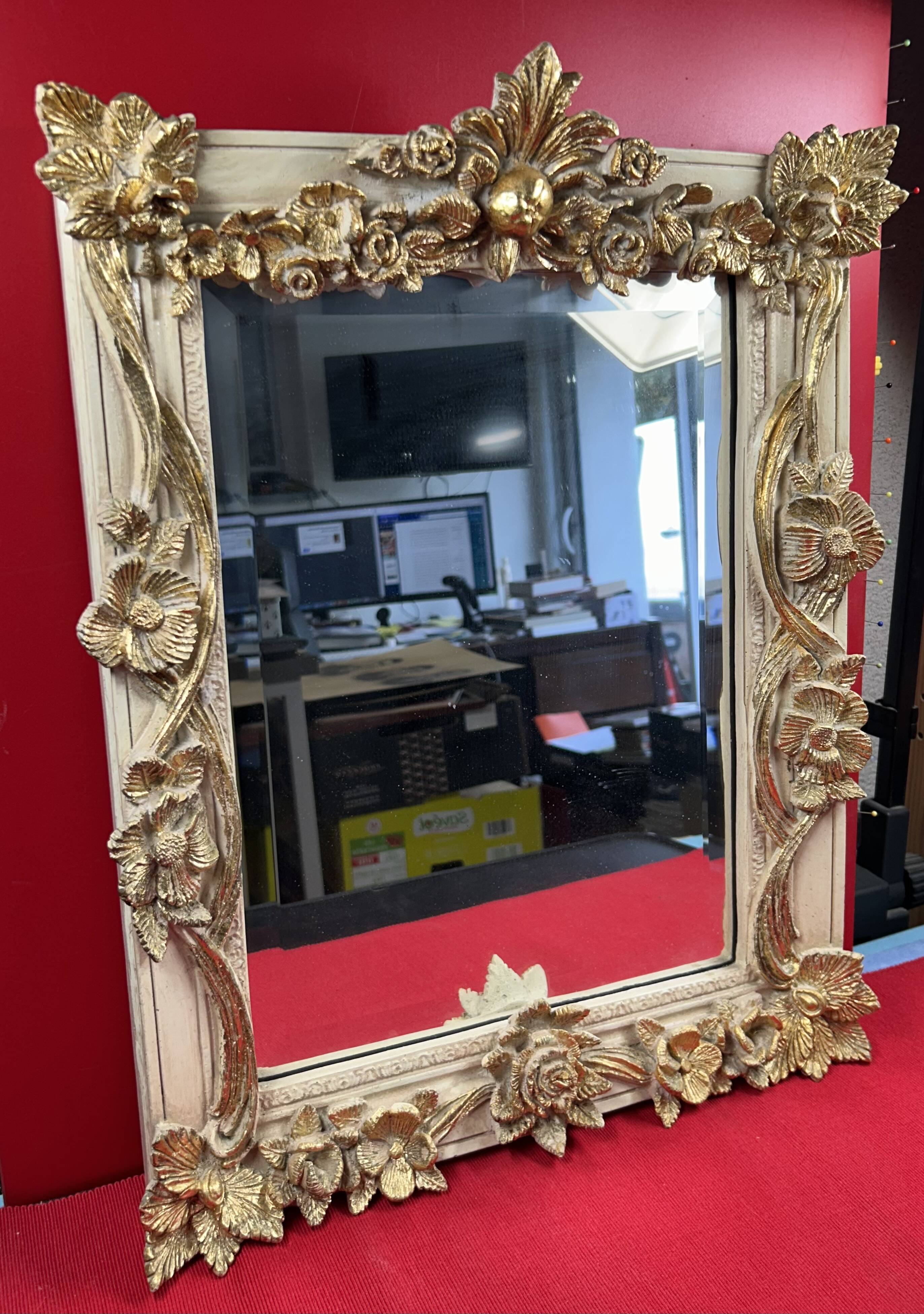19th century style beveled mirror with garlands of flowers and leaves