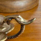 Handheld candlestick in bronze, card game decoration