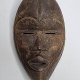 Dan mask in carved wood, brown patina, Ivory Coast, 25 cm