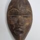 Dan mask in carved wood, brown patina, Ivory Coast, 25 cm