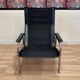 Reclining armchair in black leather and chrome design "hans eichenberger" 1960.