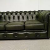 Three-seater green leather Chesterfield sofa