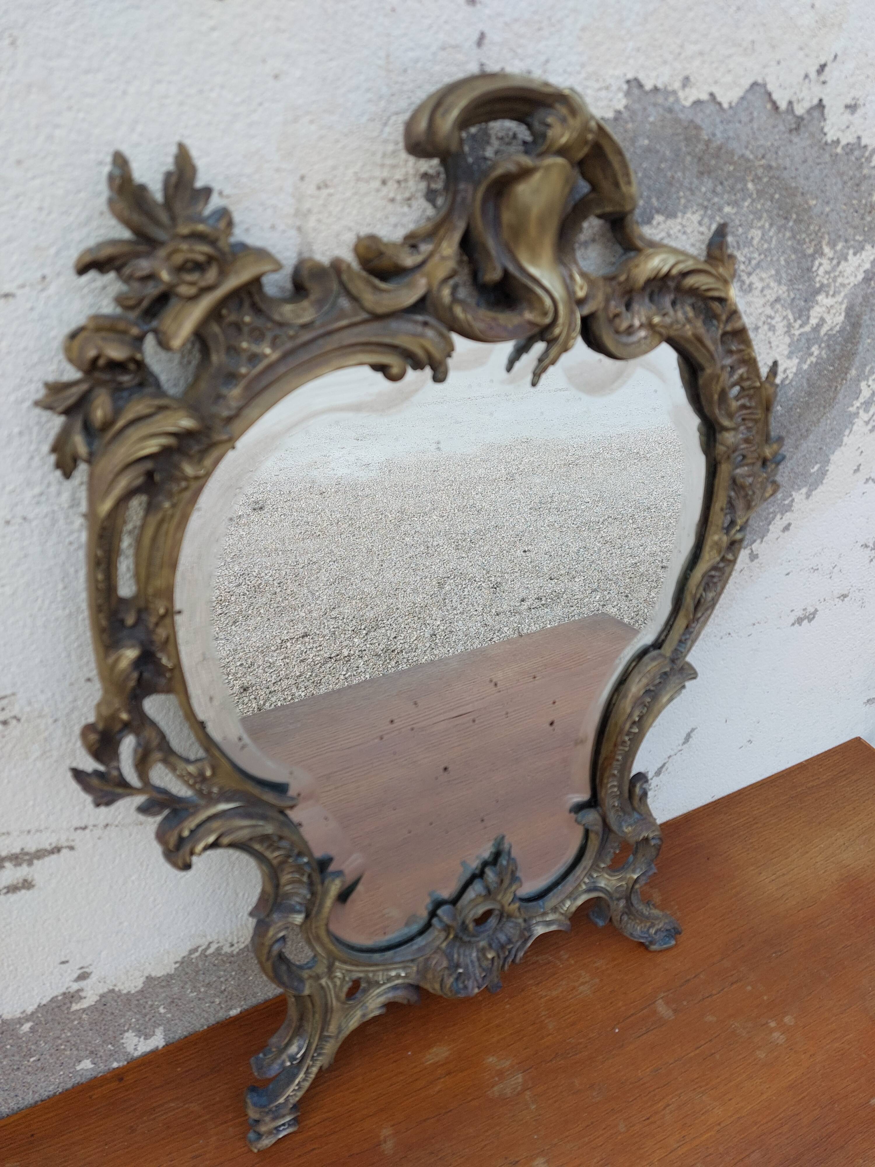 Miroir biseauté en bronze Louis XV 19ème