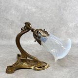 Art Nouveau wall sconces with opalescent iridescent glass