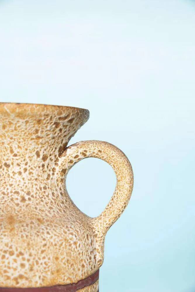 Vintage vase from the 60s, W-Germany footed vase in caramel yellow.