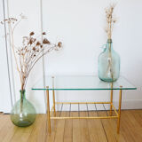 Glass coffee table with magazines holder