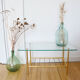 Glass coffee table with magazines holder