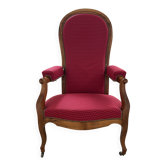 Antique Louis Philippe armchair in walnut and red fabric.