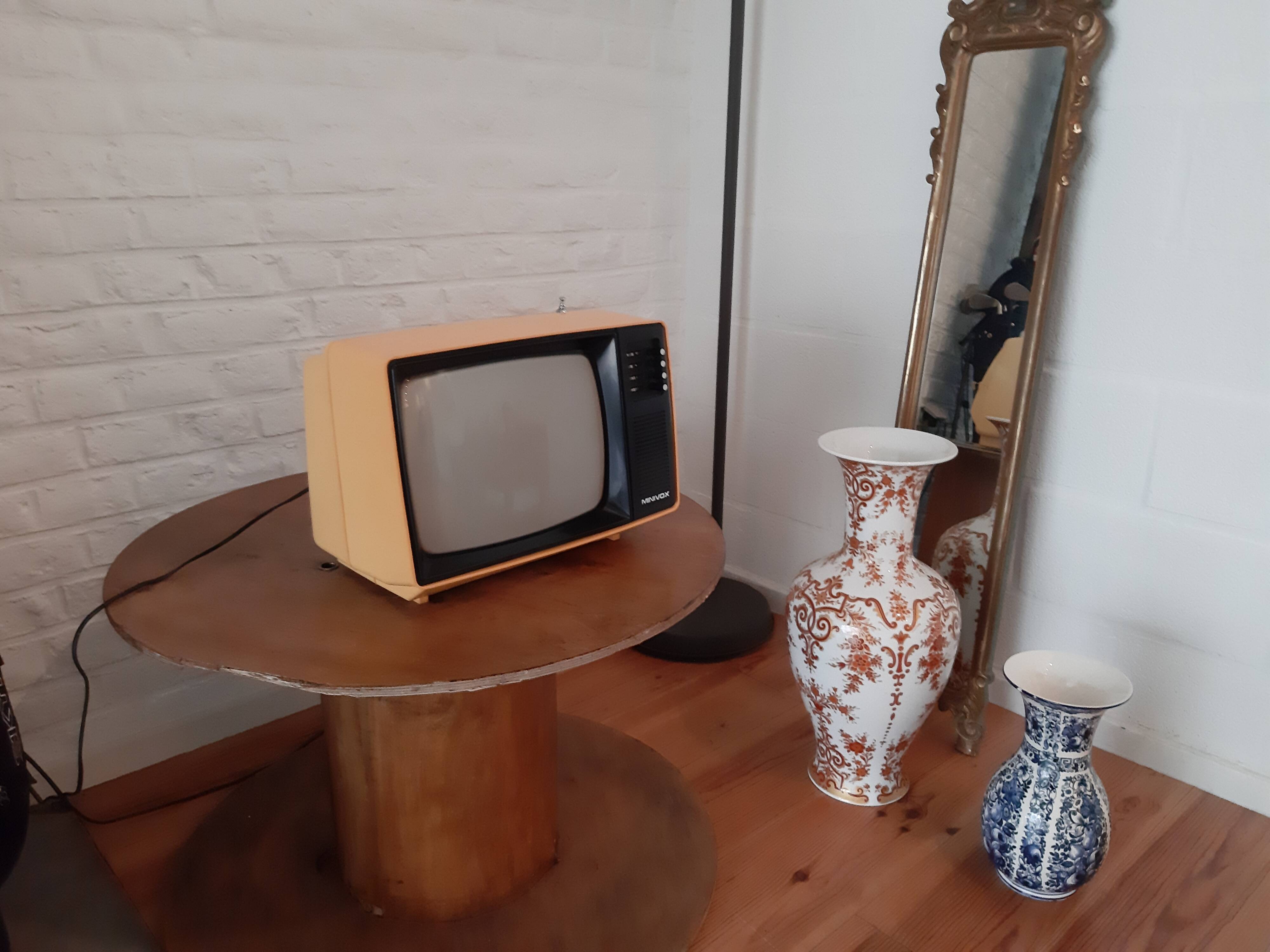 Yellow minivox vintage tv