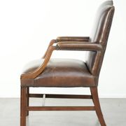 Wooden cow leather English Gainsborough chair with a stunning appearance