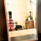 Beveled mercury mirror and japanese art nouveau illustration on the back