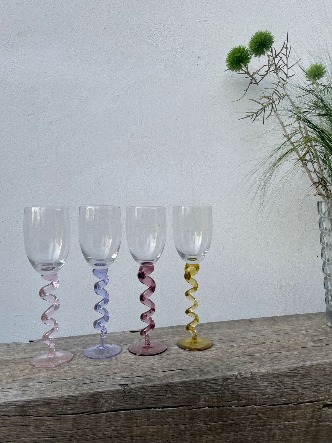 4 large, multicoloured, twisted champagne flutes