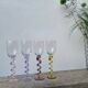 4 large, multicoloured, twisted champagne flutes