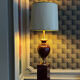 Ceramic and burgundy lacquered metal lamp