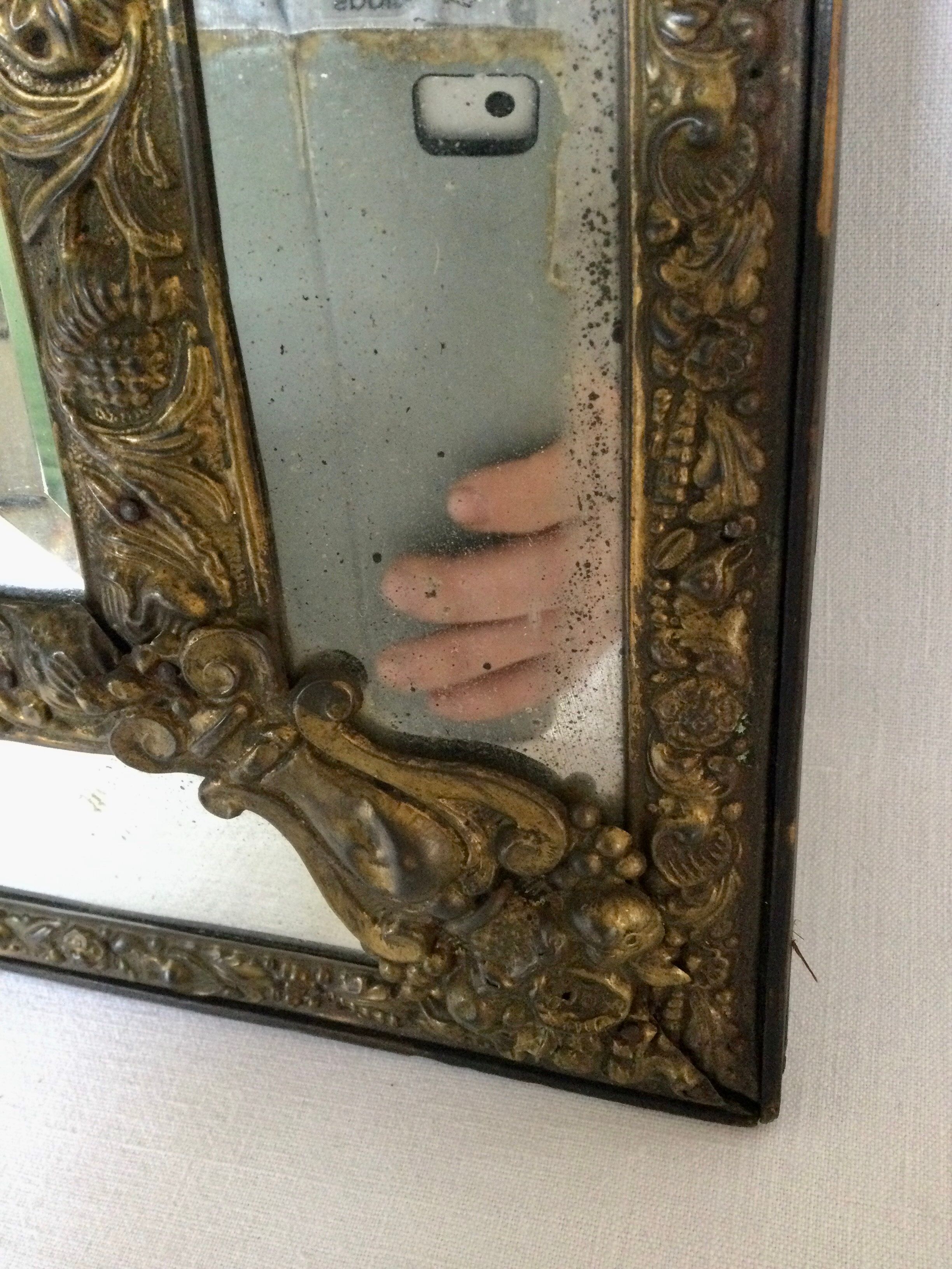 19th century embossed brass mirror with bead - 65x39cm