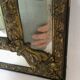 Miroir à parclose en laiton repoussé XIXème - 65x39cm