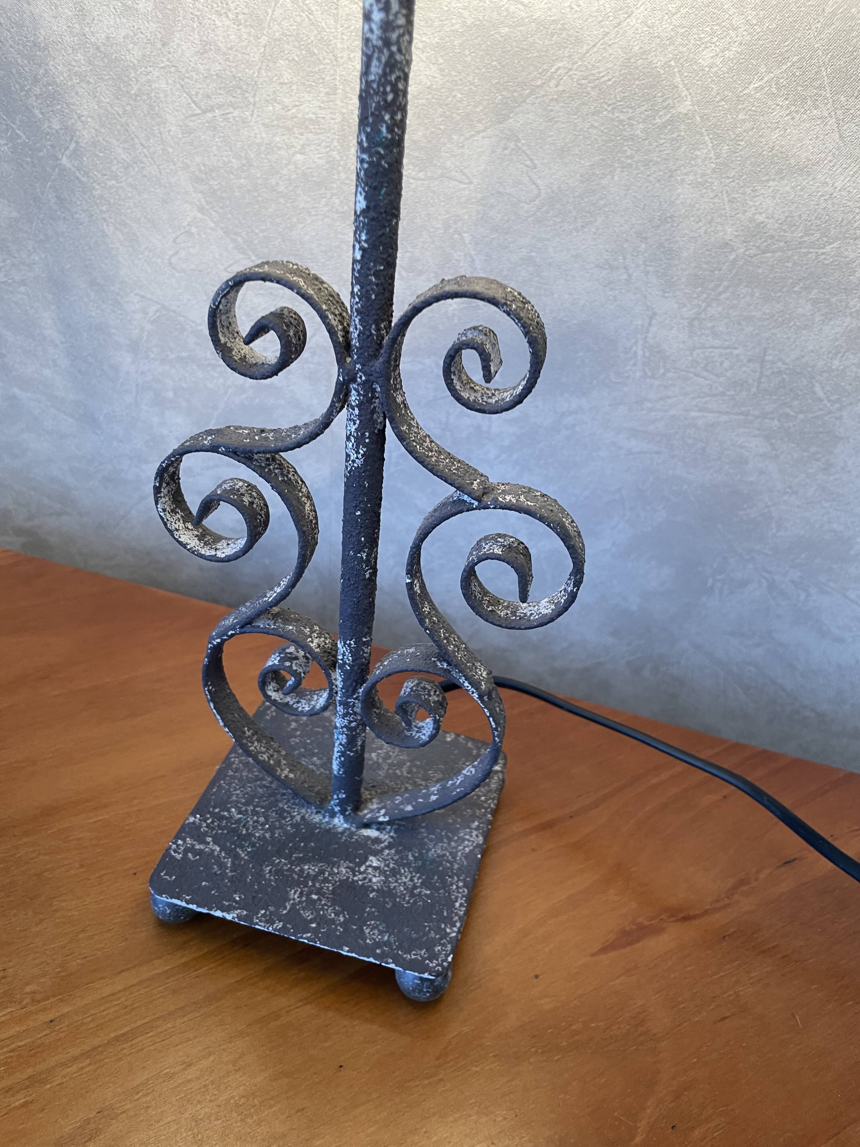 Decorative lamp with wrought iron base Loberon