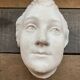 Statue murale visage plâtre