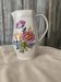 Vintage Alföldi pitcher in white porcelain with blue and red floral decoration, Folk Art.