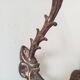Antique wall coat hook from the 19th century in Victorian cast iron style.