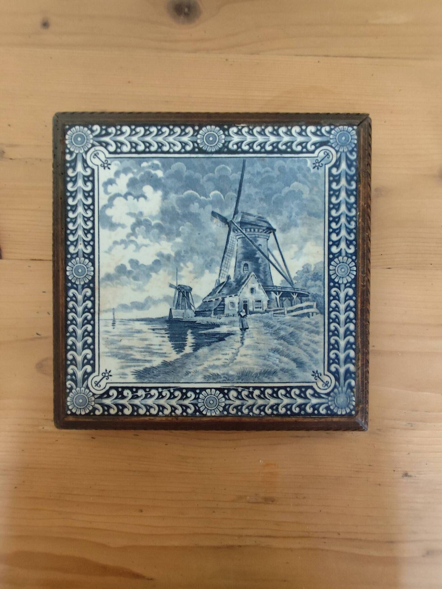 Ceramic tile trivet and wooden frame with Dutch windmill.