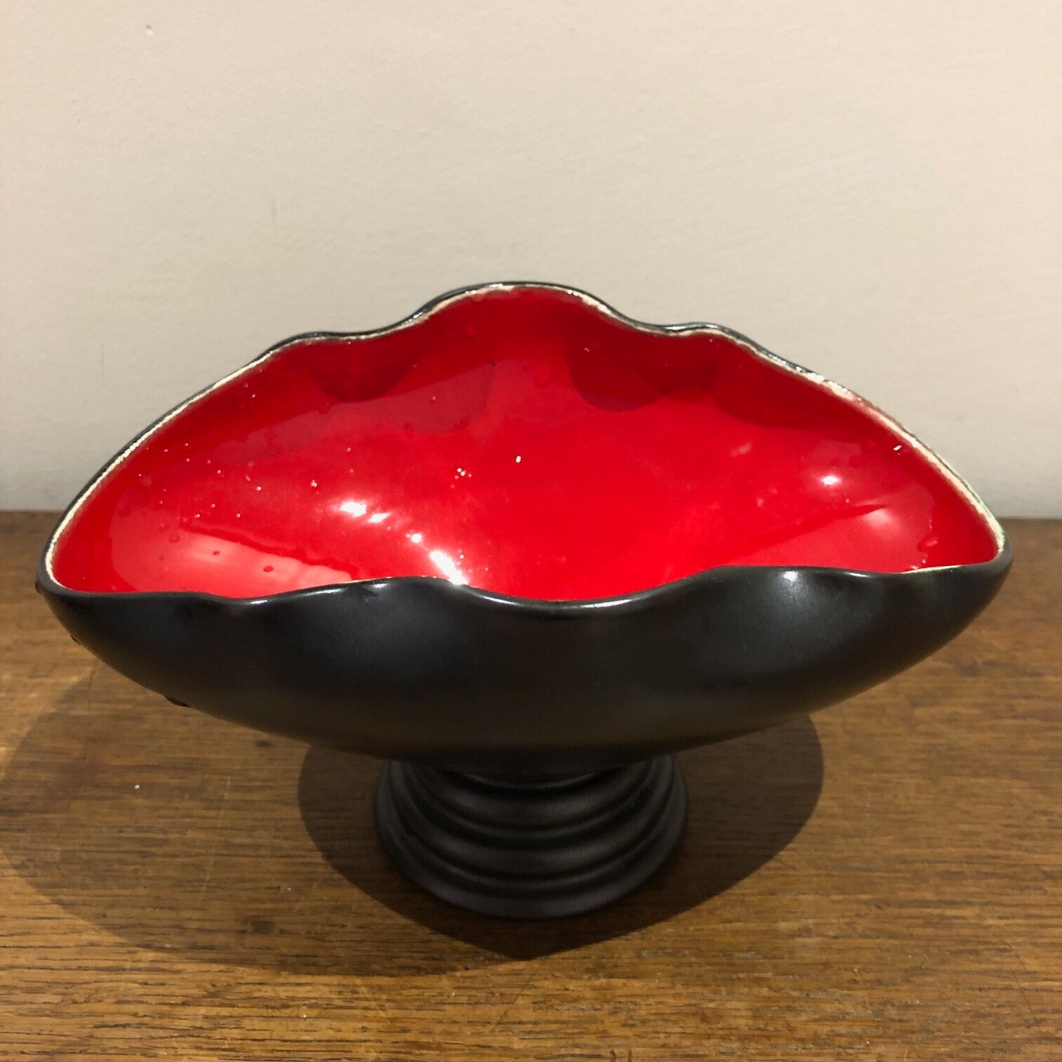 Red and black trinket bowl of the 50s