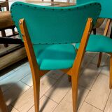 Title: Pair of vintage chairs from the 50s/60s – green vinyl seat in style
