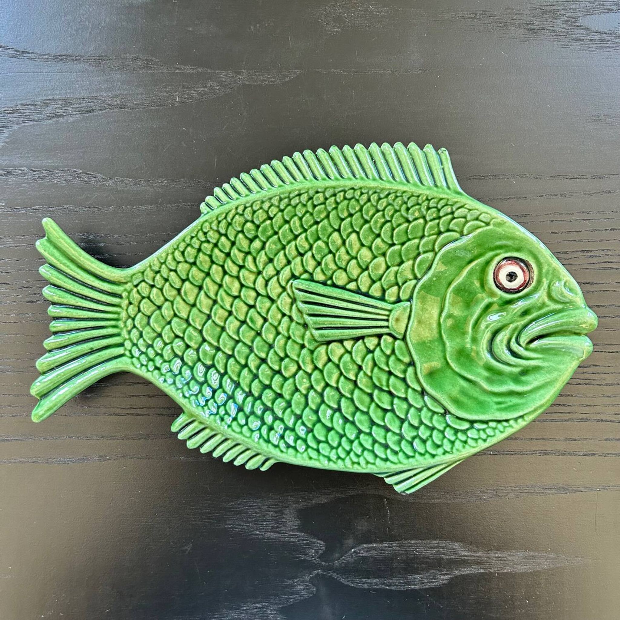 Fish dish in green earthenware