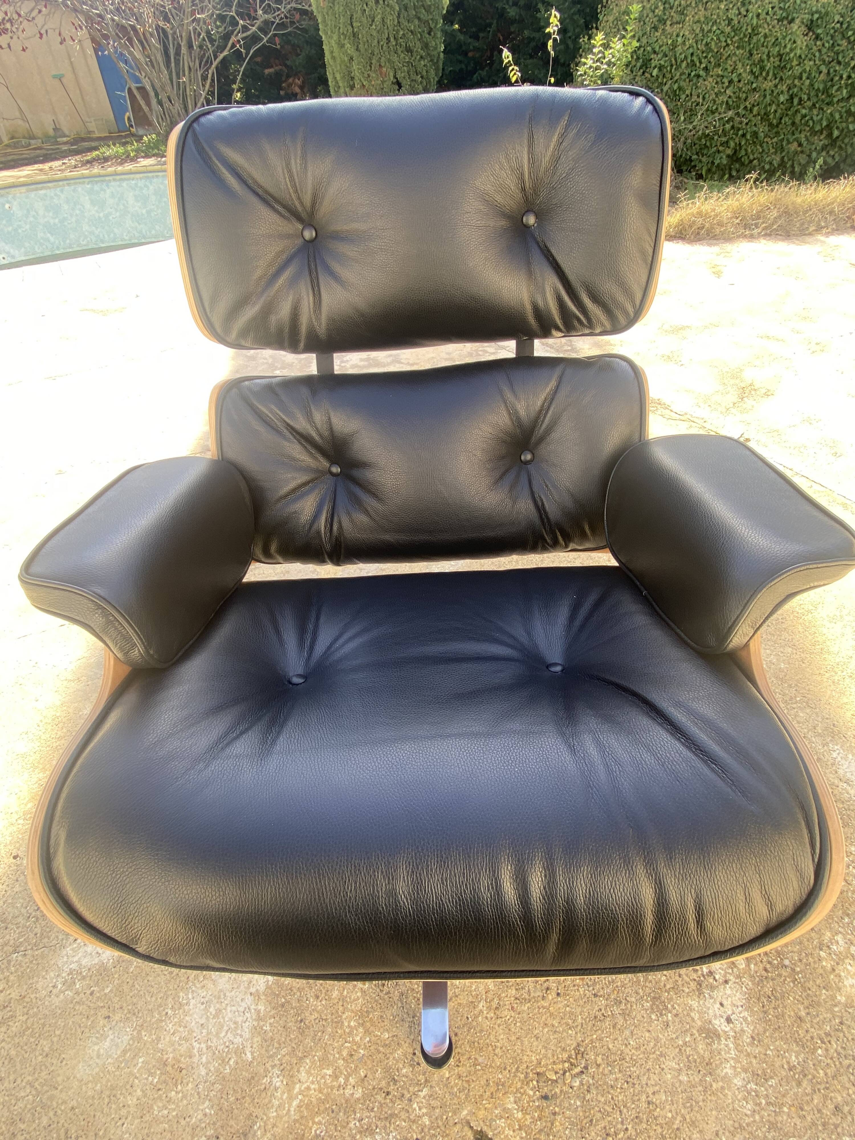 Fauteuil et Ottoman Charles Eames noir, Herman Miller, 2010